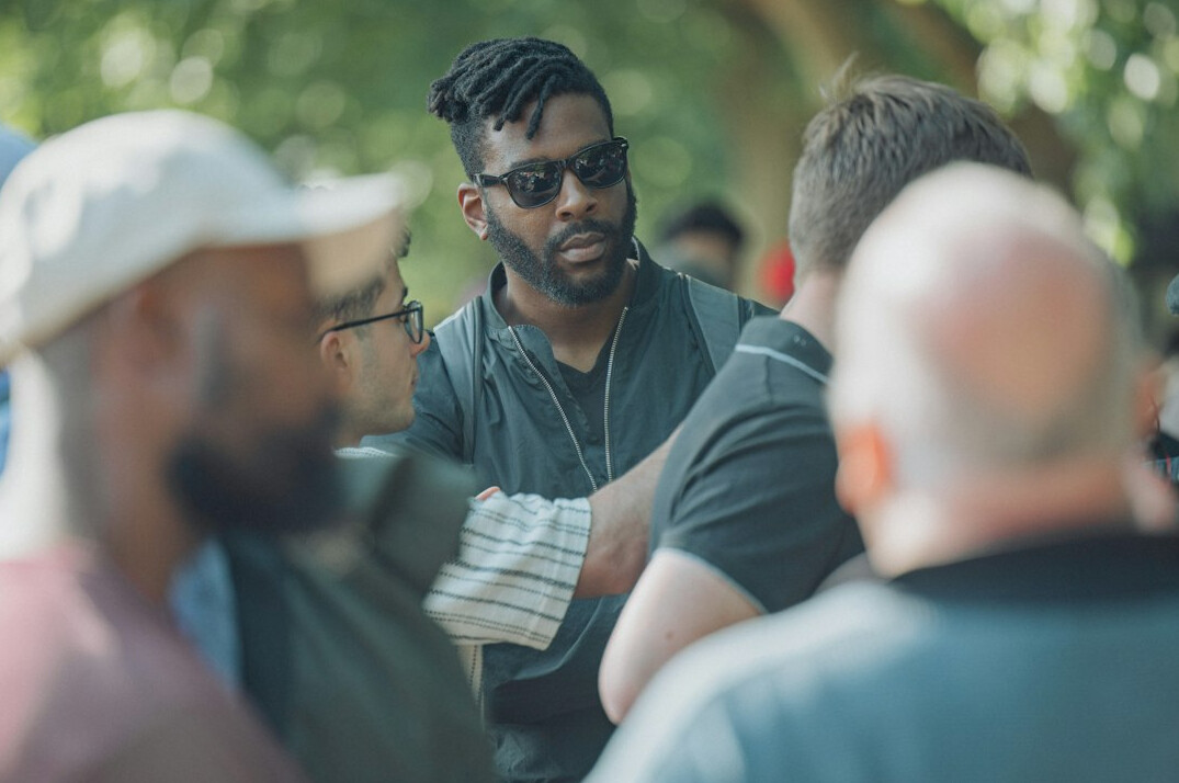 diverse crowd in heated discussion